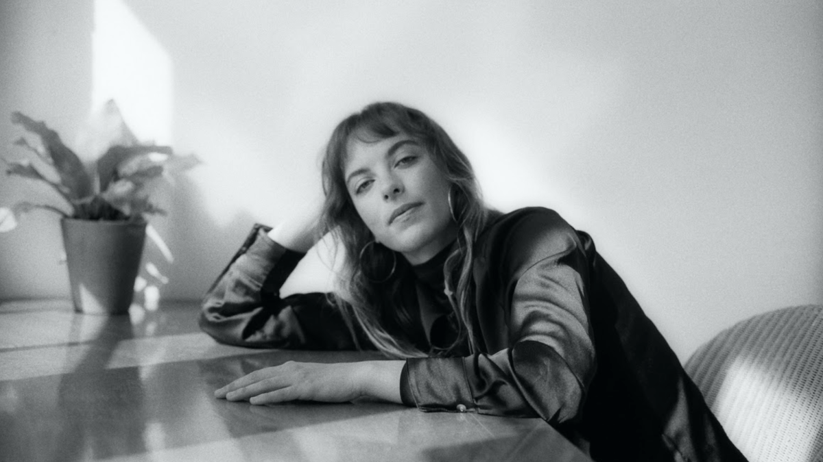 Naima Bock Adds Another Feather To Her Cap With ‘below A Massive Dark 